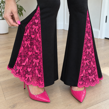 Close-up of the hot-pink lace panel with hearts, bows and tiny heels
